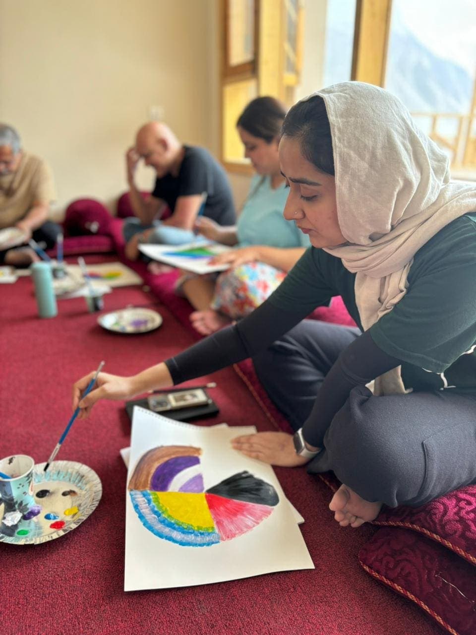 An art therapy circle at a WEEDS retreat